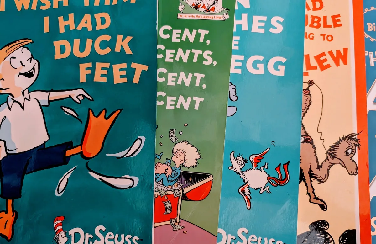 Row of colourful Dr Seuss picture books standing upright