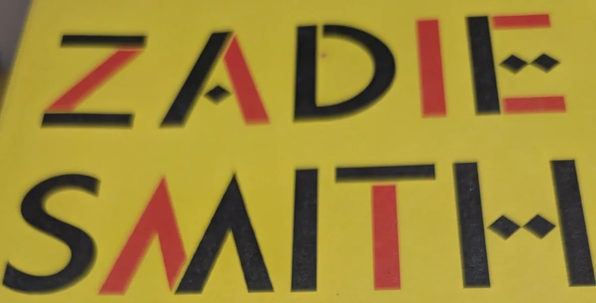 Close up of a yellow Zadie Smith book cover
