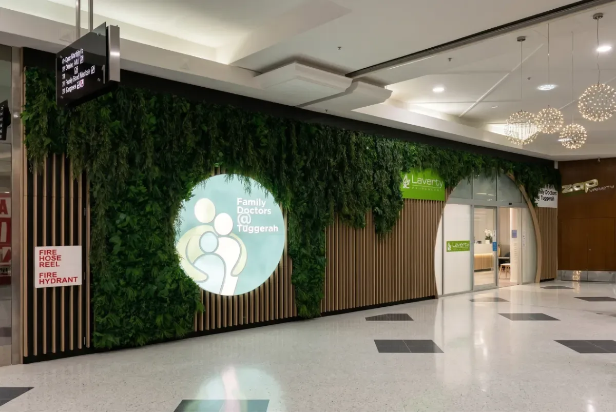 The finished Tuggerah Medical Centre, its planted wall and arched entry